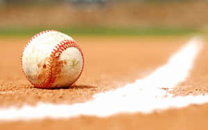 Awesome Baseball On Ground Wallpaper
