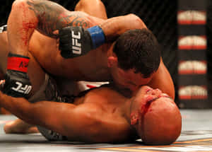 B.j. Penn In An Intense Mma Match Wallpaper