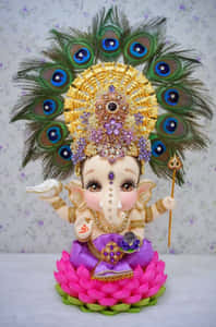 Baby Ganesh Peacock Figurine Wallpaper