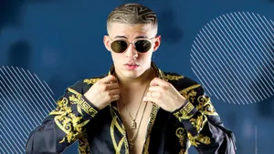 Bad Bunny Black And Gold Polo Wallpaper