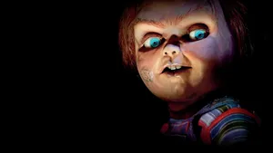Bad Guy Chucky Under Spotlight Wallpaper