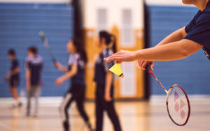 Badminton Player Serving Wallpaper