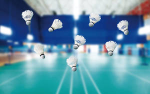 Badminton Shuttlecocks In Midair Wallpaper