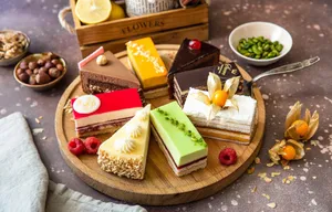 Bakery Slices Of Cheesecakes Wallpaper