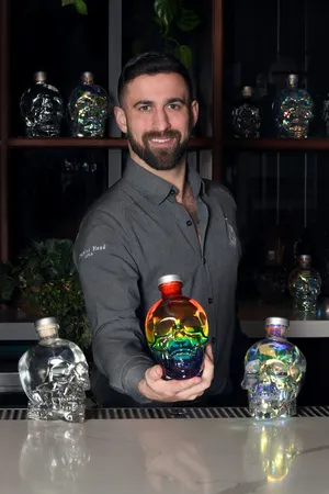 Bartender Mixing With Crystal Head Vodka Wallpaper
