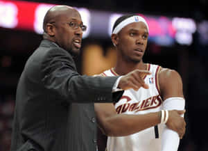 Basketball Coachand Player Discussion Wallpaper