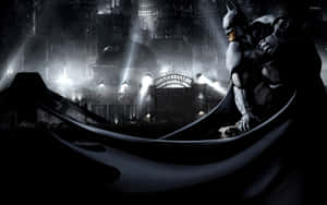 Batman Brooding Over Arkham City Wallpaper