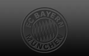 Bayern Munich's Iconic Logo On A Dark Gray Background Wallpaper