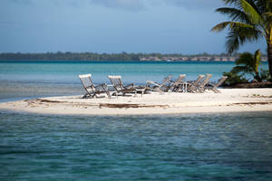 Beach Chair In French Polynesia Wallpaper