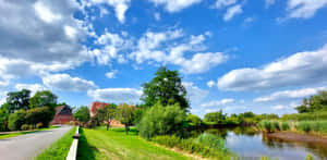 Beautiful Farmhouse Desktop In The Early Morning Sun Wallpaper
