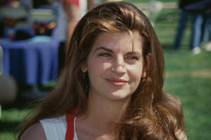 Beautiful Kirstie Alley At Softball Game In California Wallpaper