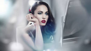 Beautiful Megan Fox Applying Red Lipstick In The Mirror Wallpaper