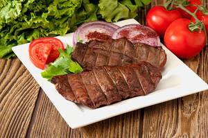 Beef Liver Slices On A Square Platter Wallpaper