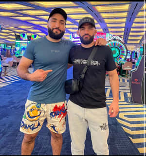 Belal Muhammad Posing With Friend Wallpaper