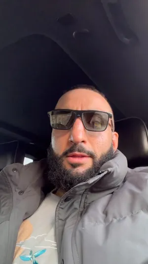 Belal Muhammad Wearing Sunglasses And Jacket Wallpaper