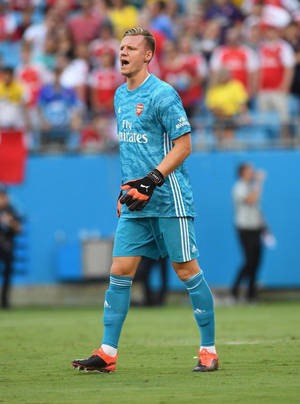Bernd Leno In Action In Light Blue Jersey Wallpaper