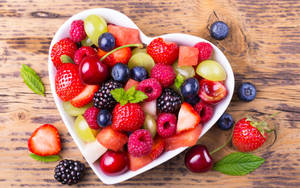 Berries On Heart-shaped Bowl Wallpaper