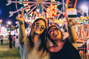 Best Friends Enjoying The Fair Wallpaper