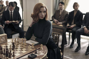 Beth Harmon (anya Taylor-joy) Taking On The Challenge Of Russian Grandmaster Vasily Borgov (marcin Dorociński) In A Match Of The Queen’s Gambit. Wallpaper