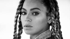 Beyonce Wears Her Signature Braids With Statement Earrings Wallpaper