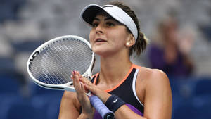 Bianca Andreescu, Champion Tennis Player, Grasps Racket Intensely Wallpaper