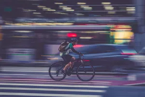 Bicycle Riding Along A Bridge In A Time-lapse. Wallpaper