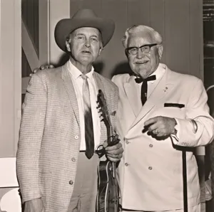 Bill Monroe With Colonel Sanders 1950s Wallpaper