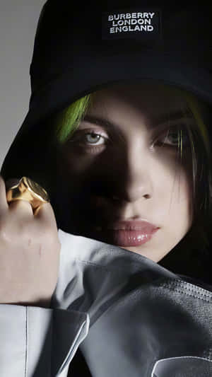 Billie Eilish Wearing A Cap Wallpaper