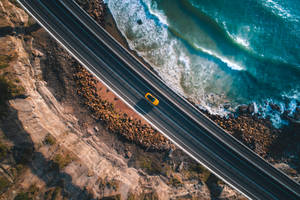 Bird's Eye View Of Car In Highwa Y Wallpaper