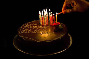 Birthday Cake With Lit Candles Wallpaper