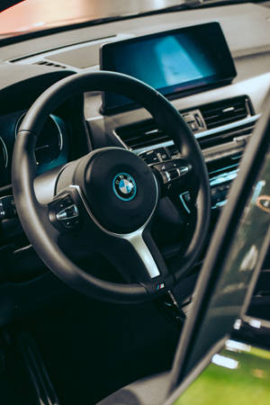 Black Bmw Steering Wheel Shot Wallpaper