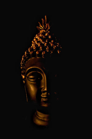 Black Buddha Golden Light Wallpaper