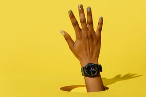 Black Casual Watch Yellow Background Wallpaper