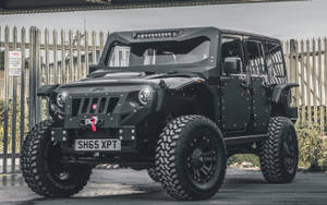 Black Jeep Wrangler With Armor Kit Wallpaper