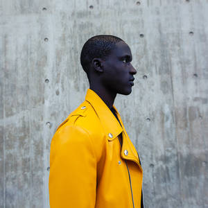 Black Man In Yellow Leather Jacket Wallpaper