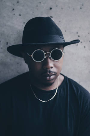 Black Man With Windsor Sunglasses On Wallpaper