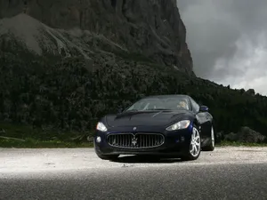 Black Maserati On A Cliff 4k Wallpaper