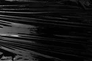 Black Plastic Stretched Wallpaper