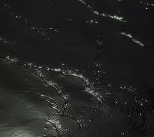 Black Rippling Water Wallpaper