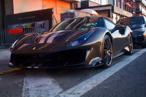 Black Sports Car On Sidewalk Wallpaper