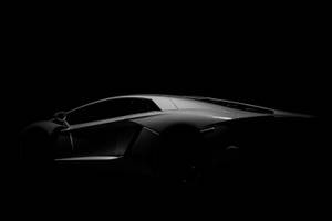 Black Sports Cars In The Dark Wallpaper