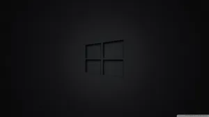 Black Windows Logo On A Dark Screen Wallpaper