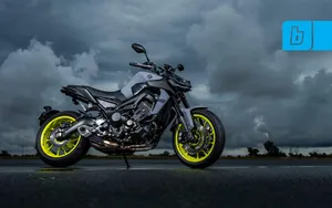 Black Yamaha Mt 15 With Yellow Rims Wallpaper