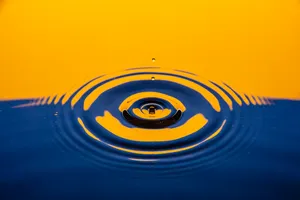 Blue And Orange Inflatable Boat Wallpaper