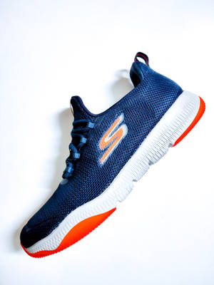 Blue And Orange Skechers Wallpaper