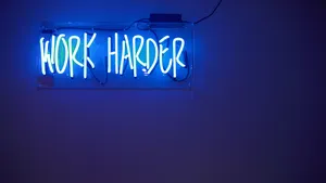 Blue Neon Sign Work Harder Wallpaper
