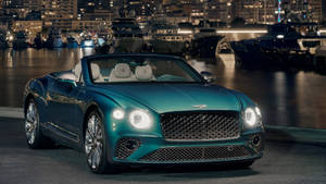 Bluish-green Bentley 4k Laptop Car Wallpaper