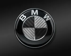 Bmw Logo On A Charcoal Grey Background Wallpaper