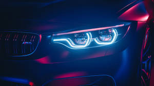 Bmw M4 Bright Headlights Close-up Wallpaper