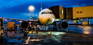 Boarding Ramp Attached To Airplane 4k Wallpaper